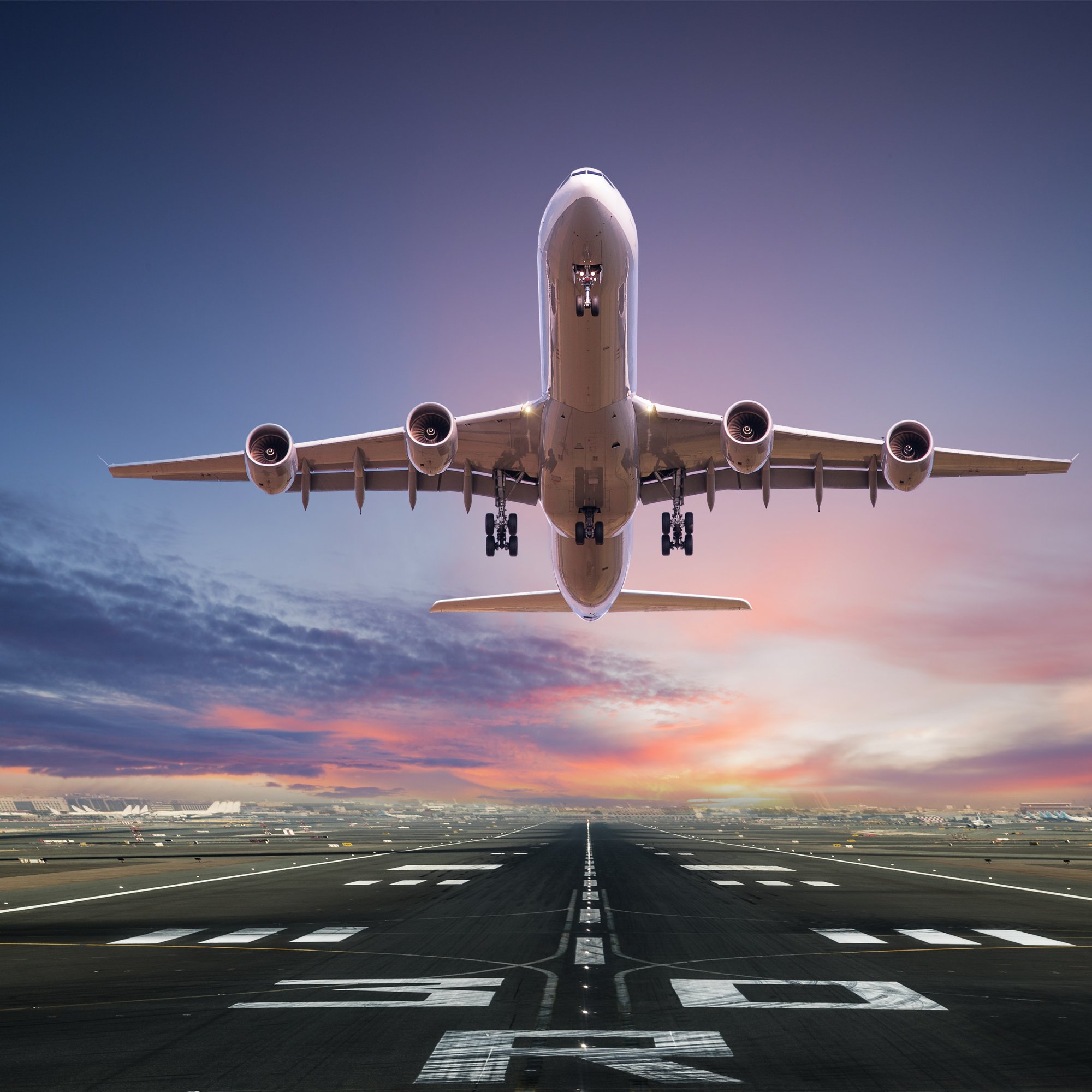 Plane in an airport representing airines